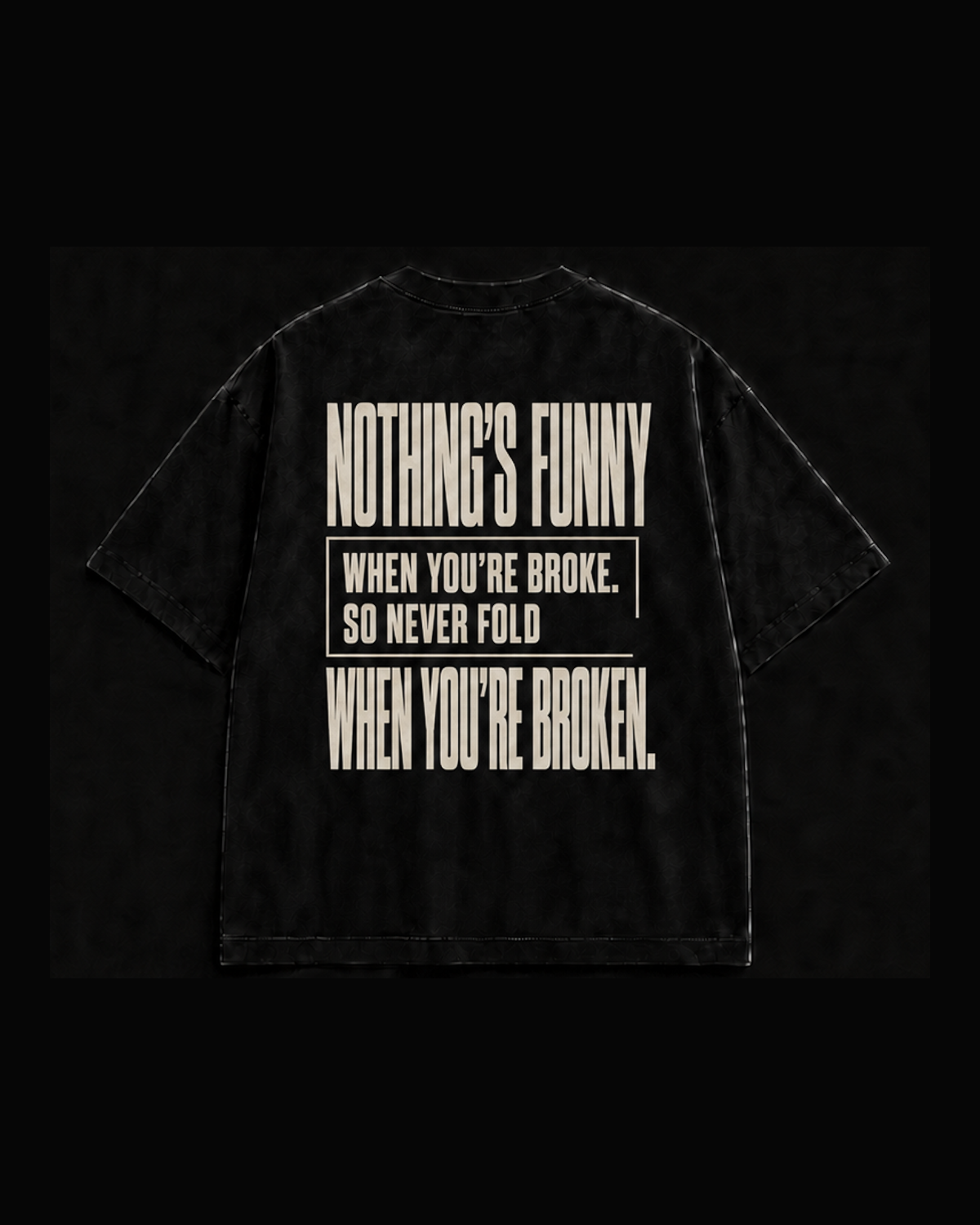 Rebuild Tee back print: Nothing’s funny, the original tall condensed lettering and partial frame around When you’re broke. So never fold, then When you’re broken.